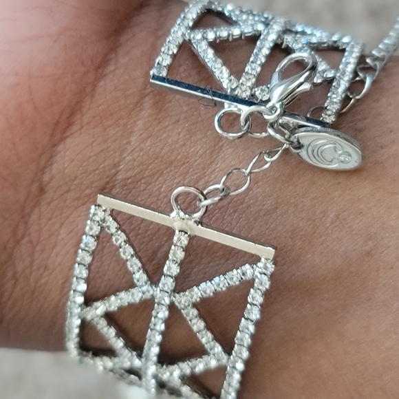 3 fashion bracelets. Two silver, one purple - Picture 7 of 8